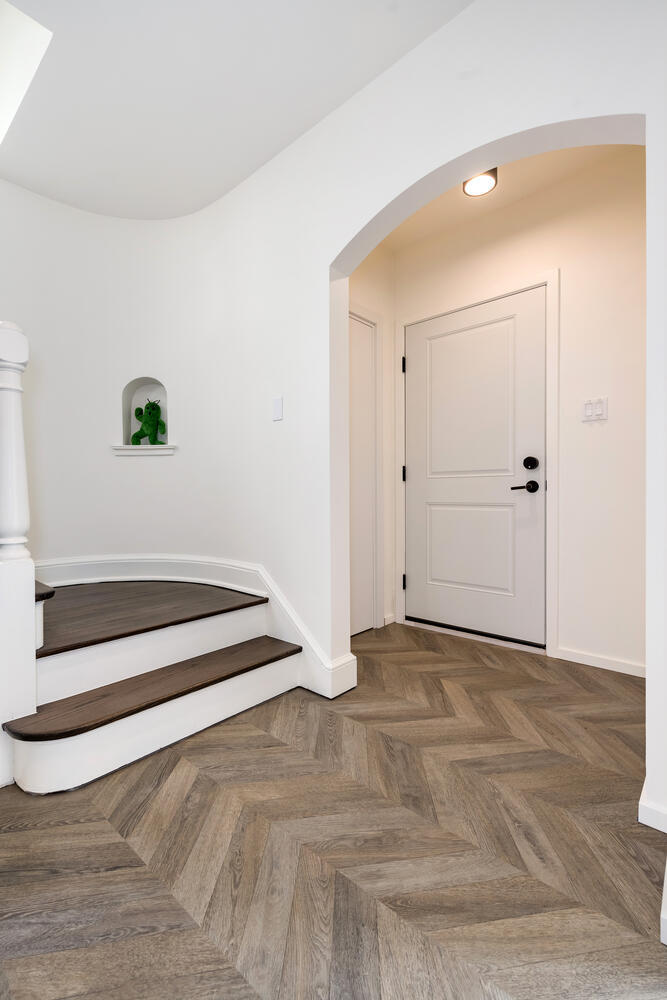 2333 Ridgeway Avenue Evanston, IL 60201 - Photo 3 of 35 a view of a room with wooden floor and white walls
