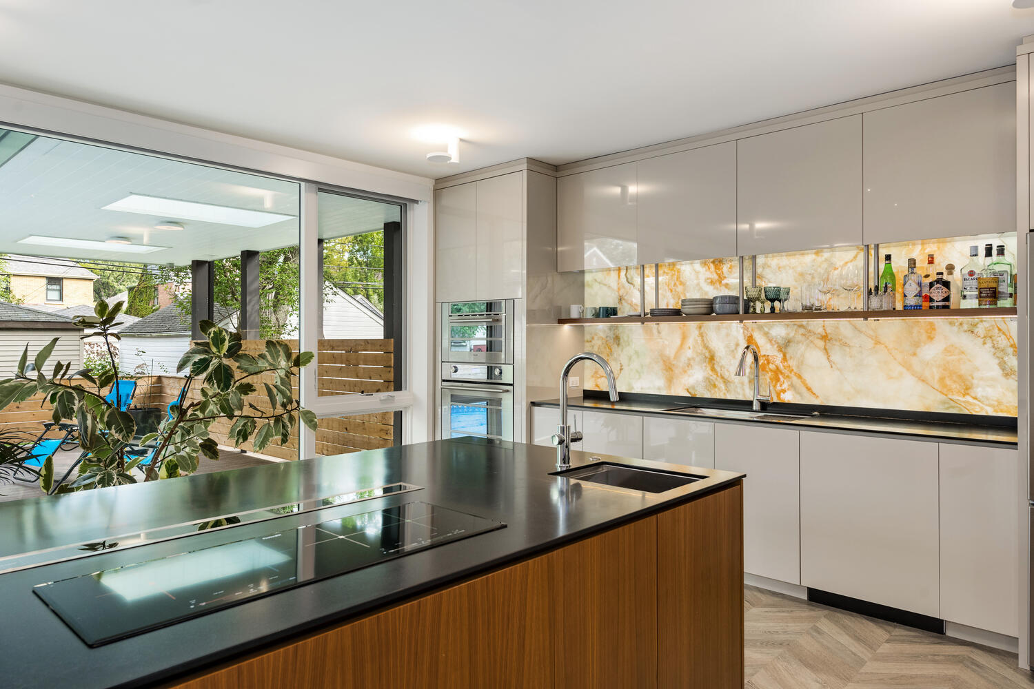 2333 Ridgeway Avenue Evanston, IL 60201 - Photo 10 of 35 a view of a kitchen with kitchen island a large counter top space a sink and appliances