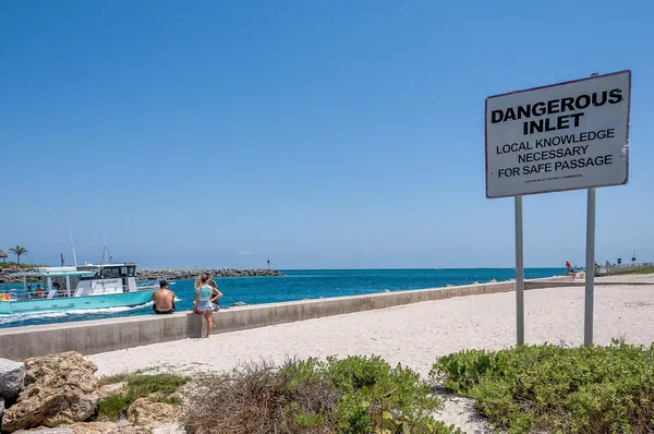 a view of a street with a big yard