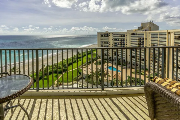 a view of a balcony with an outdoor space