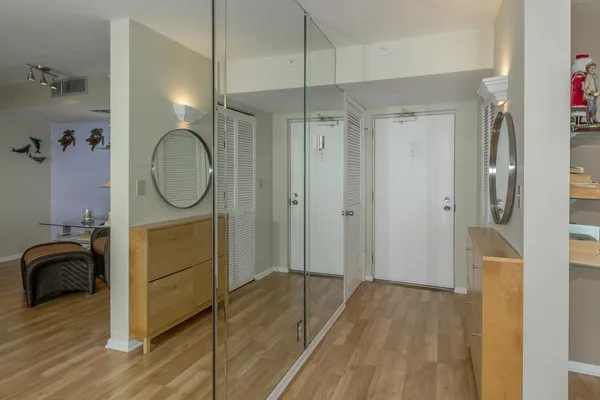 a view of a bathroom sink and a mirror