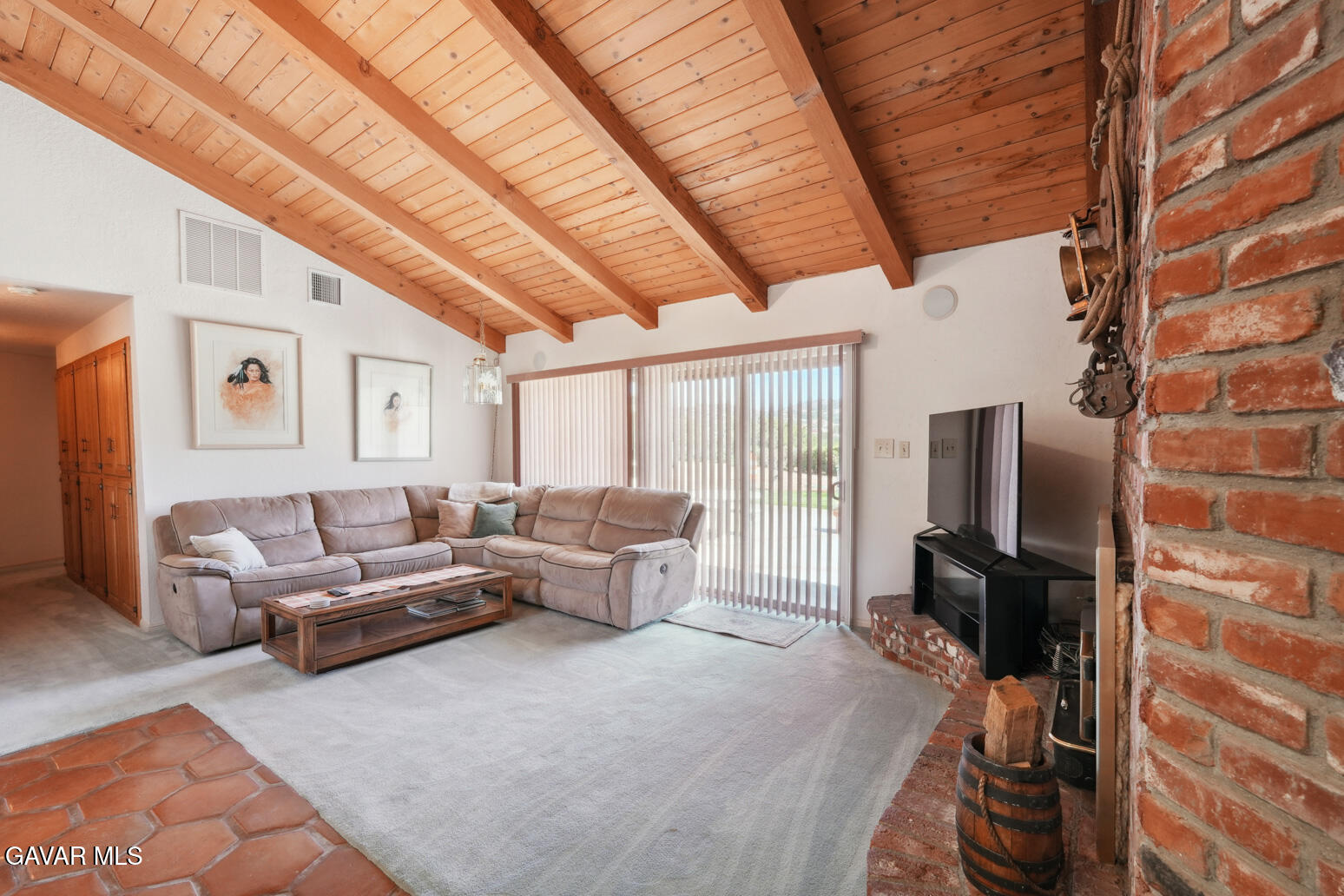 6020 Valley Sage Road Acton, CA 93510 - Photo 11 of 40 a living room with furniture wooden floor and a flat screen tv