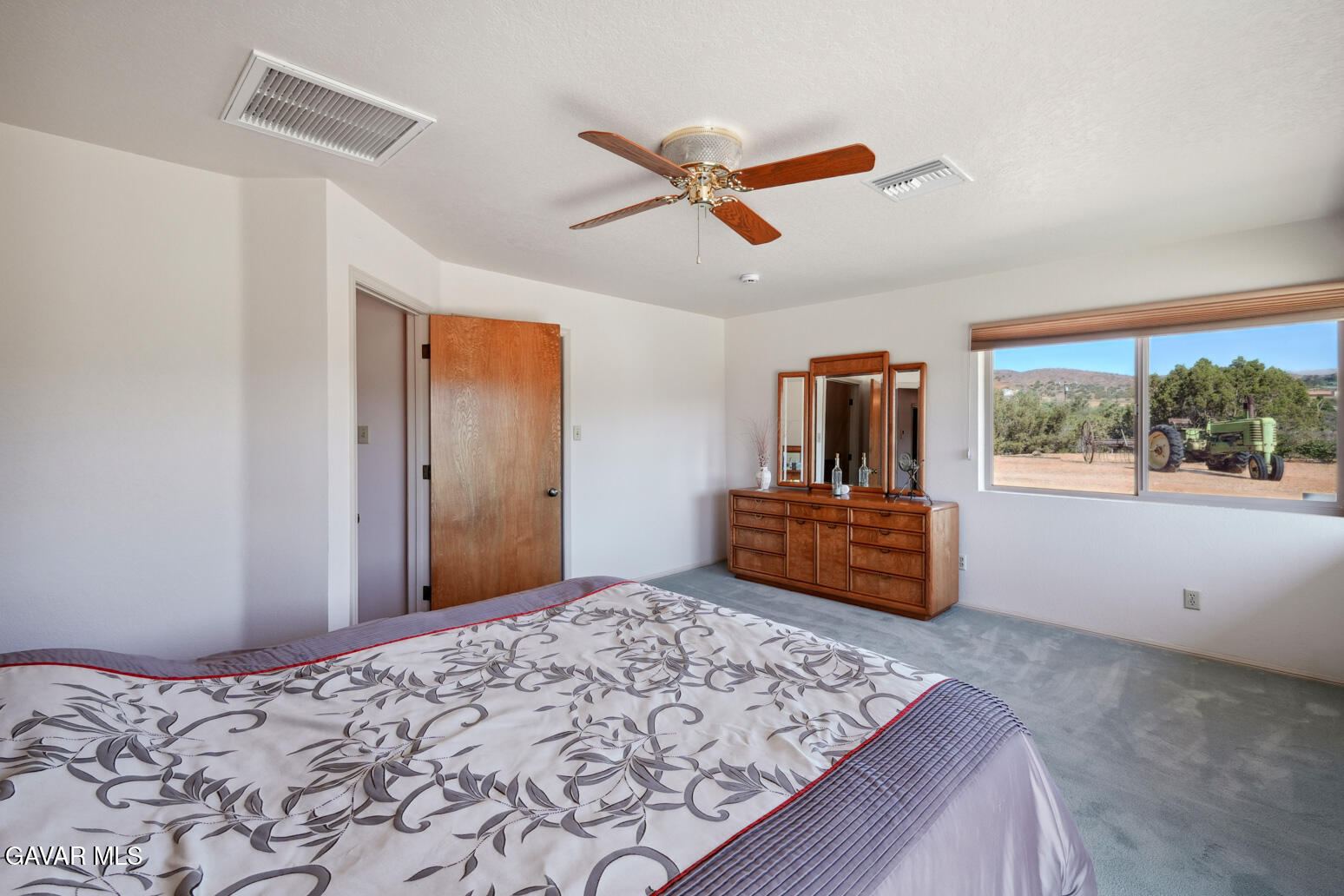 6020 Valley Sage Road Acton, CA 93510 - Photo 22 of 40 a bedroom with a bed and a window