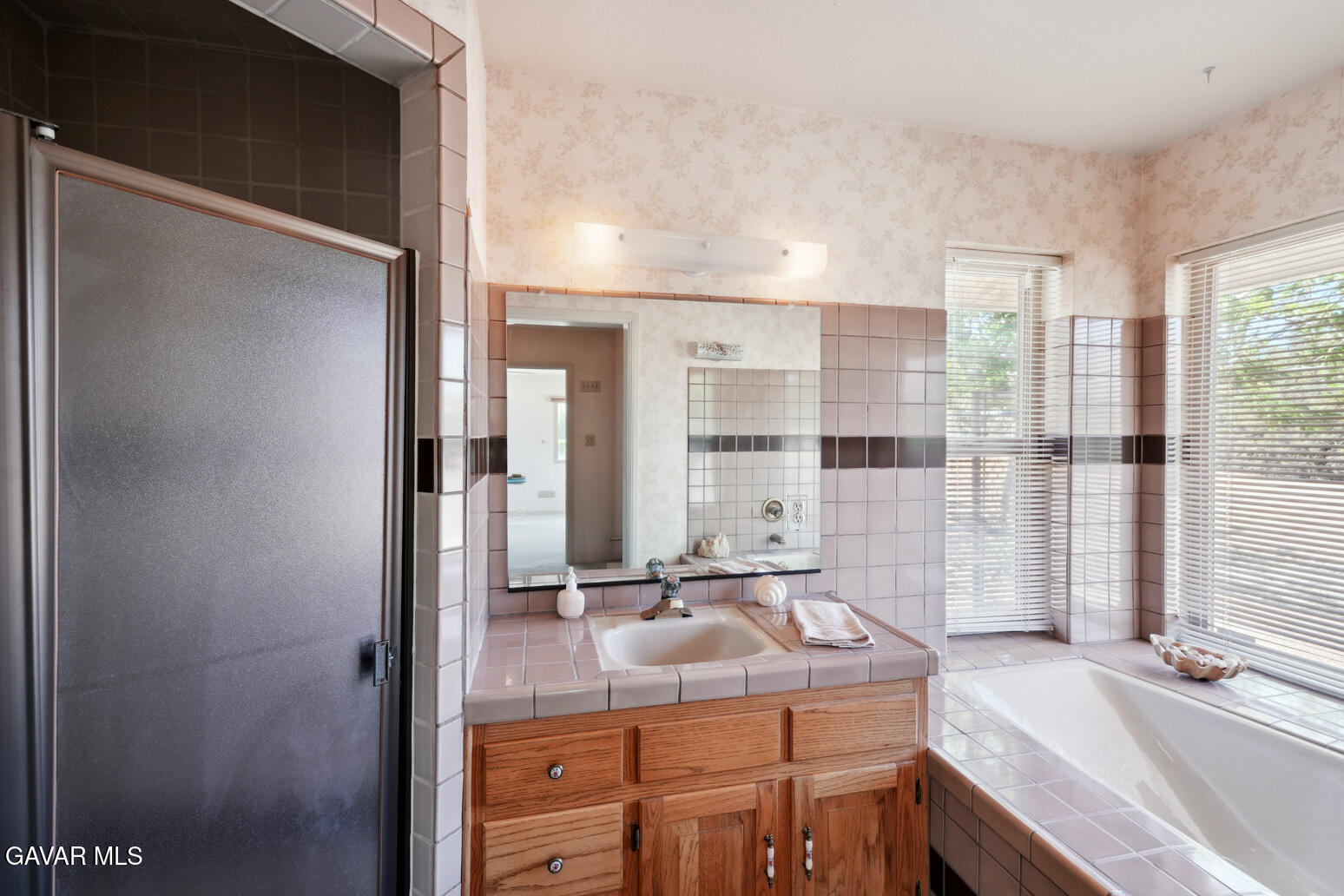 6020 Valley Sage Road Acton, CA 93510 - Photo 25 of 40 a bathroom with a sink double vanity and a mirror