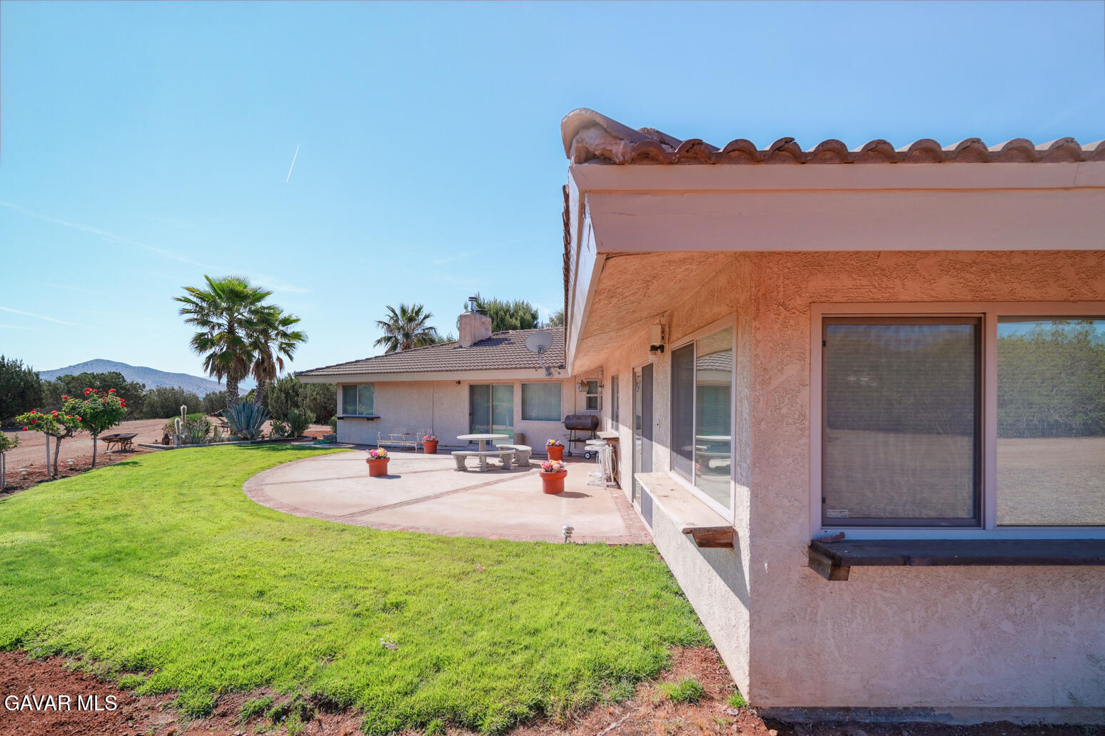 6020 Valley Sage Road Acton, CA 93510 - Photo 30 of 40 a view of a house with backyard porch and sitting area