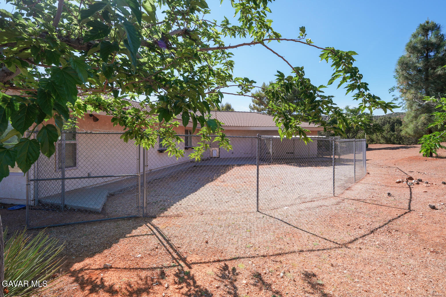 6020 Valley Sage Road Acton, CA 93510 - Photo 34 of 40 a lawn chairs sitting in a backyard of a house