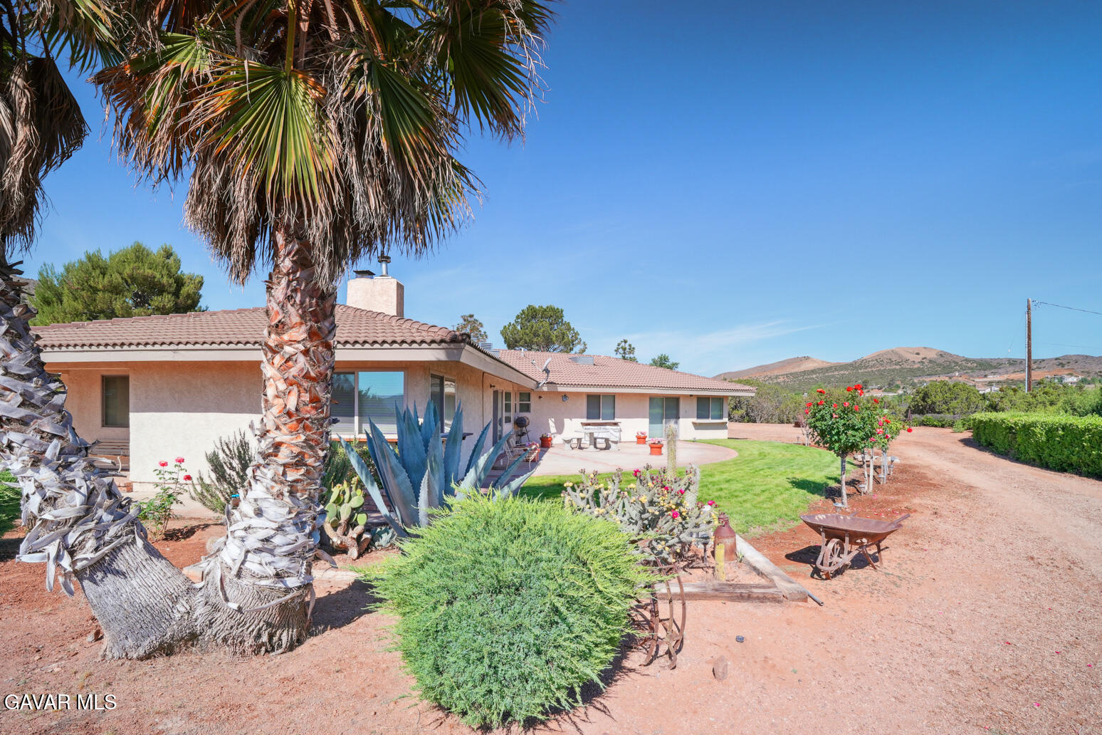 6020 Valley Sage Road Acton, CA 93510 - Photo 36 of 40 a front view of a house with garden