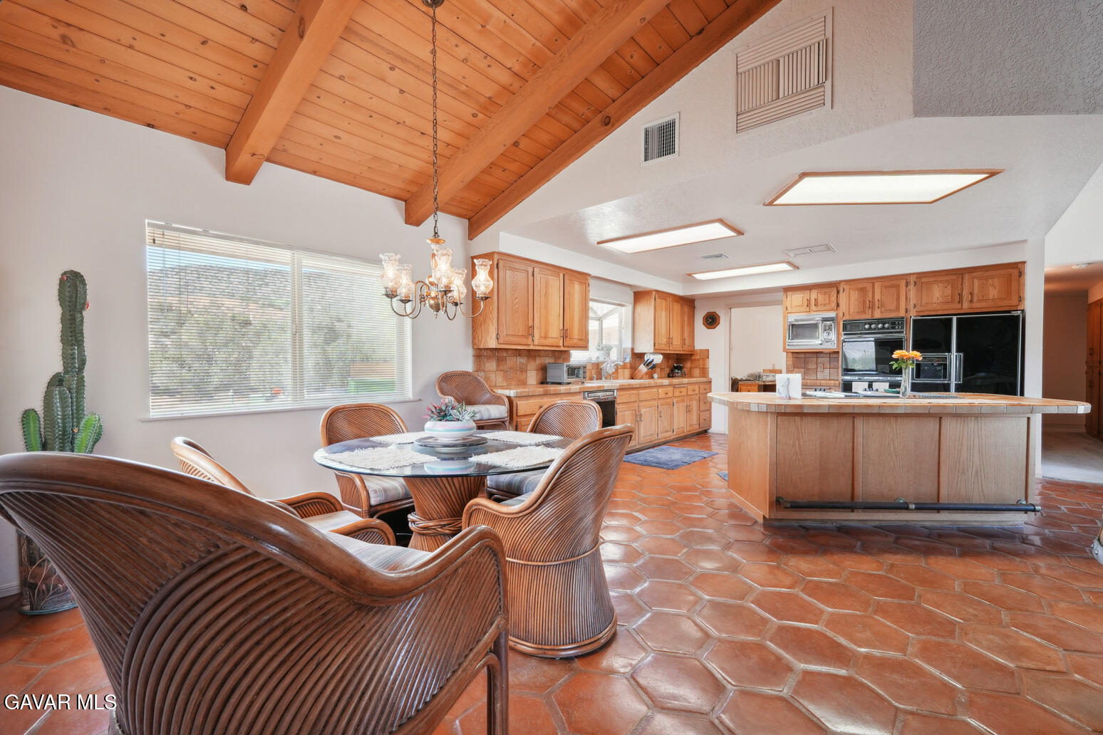 6020 Valley Sage Road Acton, CA 93510 - Photo 4 of 40 a dining room with furniture and a large window