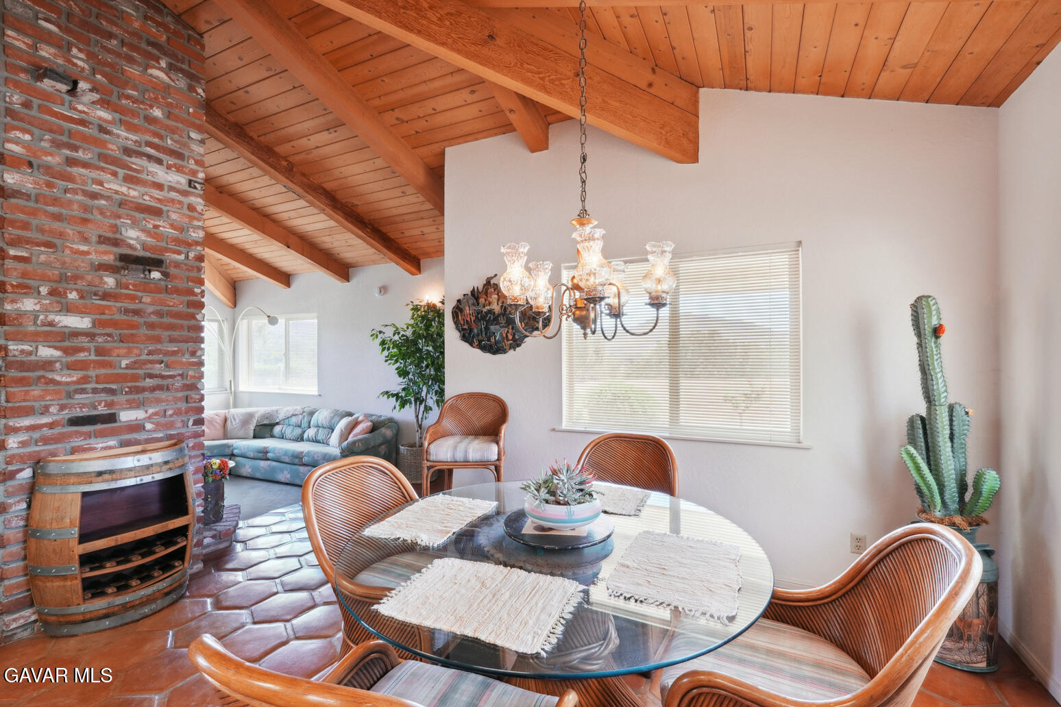 6020 Valley Sage Road Acton, CA 93510 - Photo 7 of 40 a view of a dining room with furniture a chandelier and wooden floor