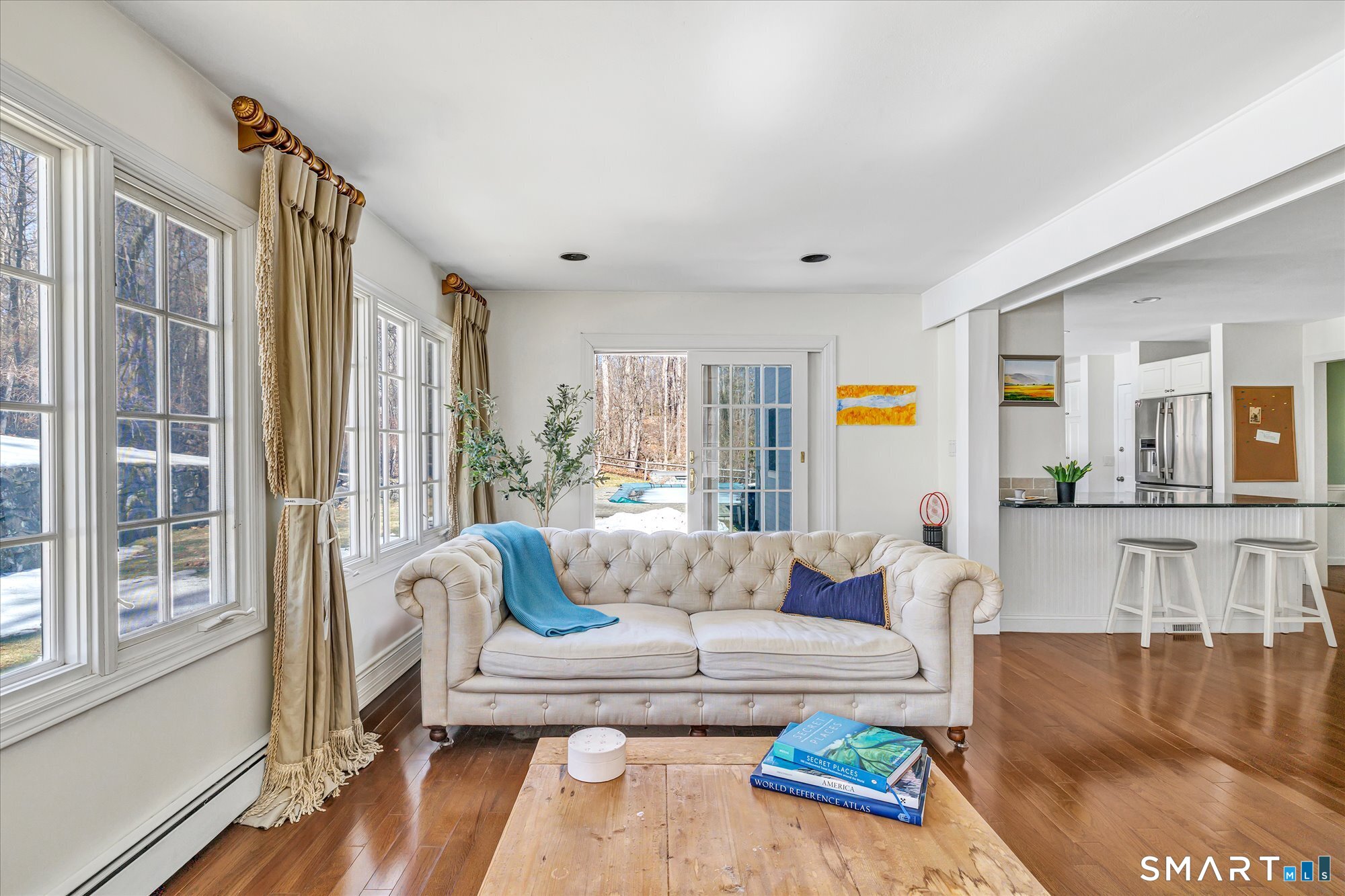 39 Marion Road Westport, CT 06880 - Photo 14 of 46 a living room with furniture and a large window