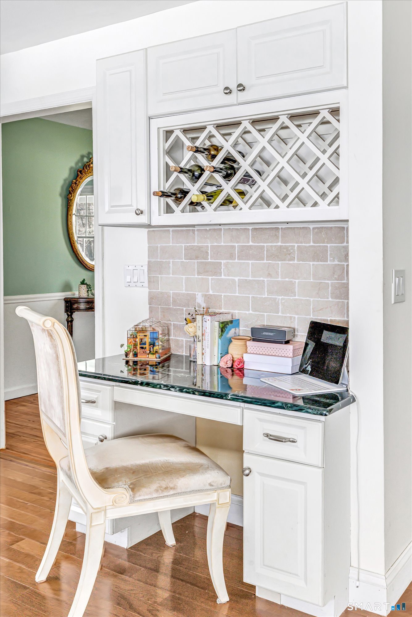 39 Marion Road Westport, CT 06880 - Photo 20 of 46 a kitchen with a stove and a white wooden cabinets