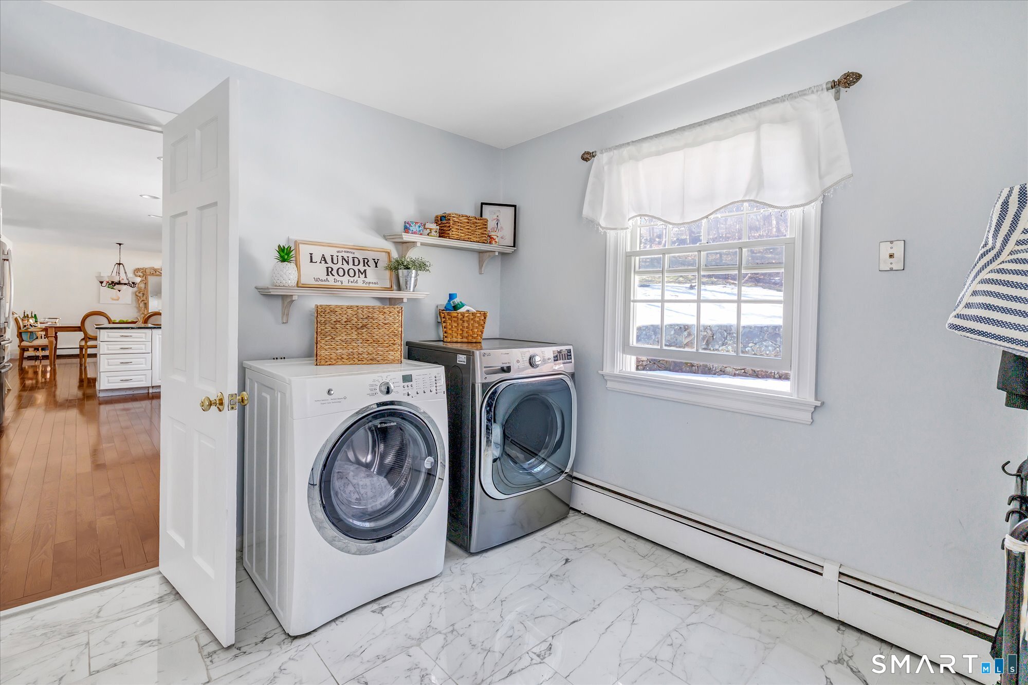 39 Marion Road Westport, CT 06880 - Photo 22 of 46 a utility room with closet dryer and washer