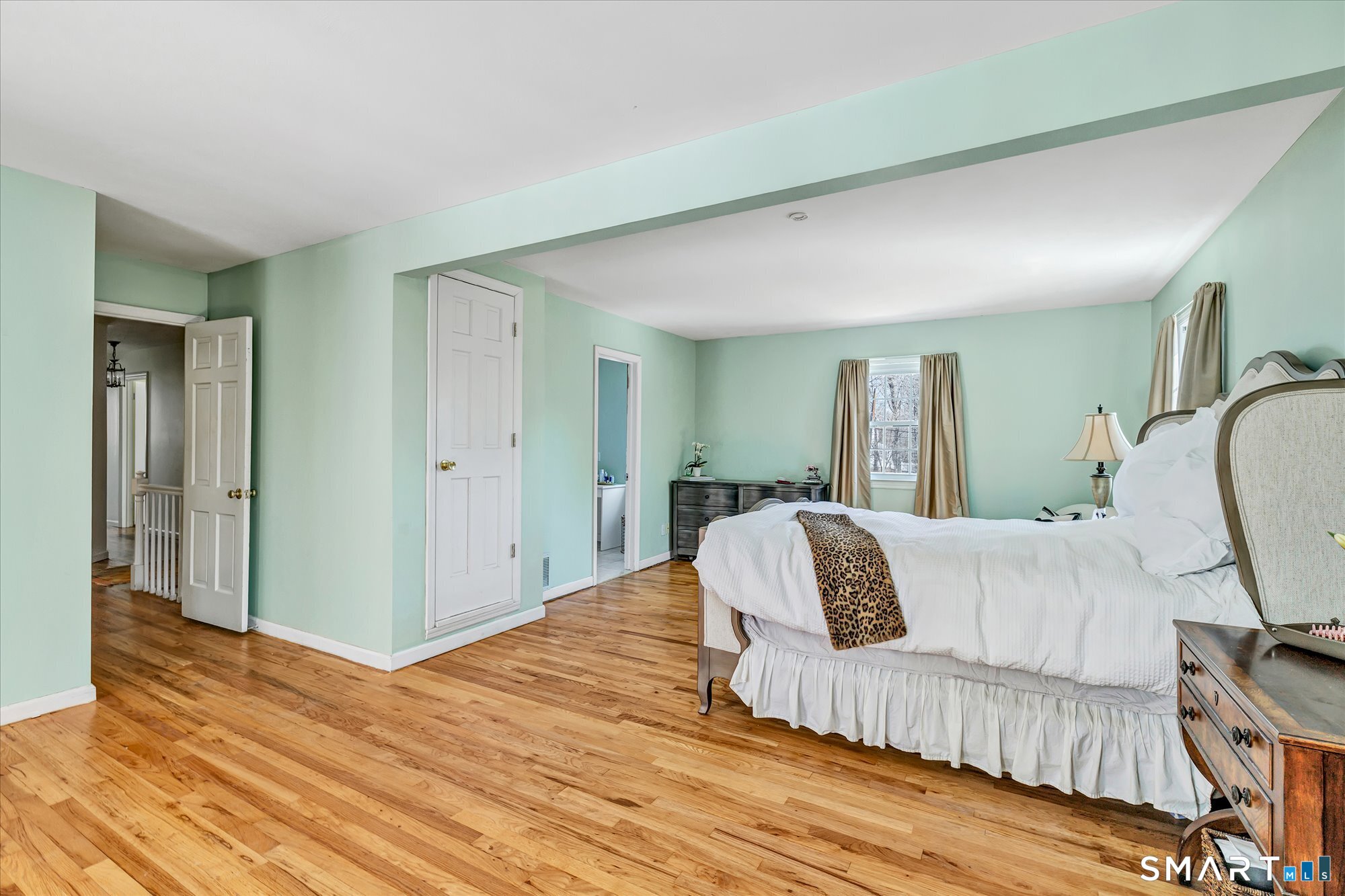 39 Marion Road Westport, CT 06880 - Photo 26 of 46 a living room with furniture and a wooden floor