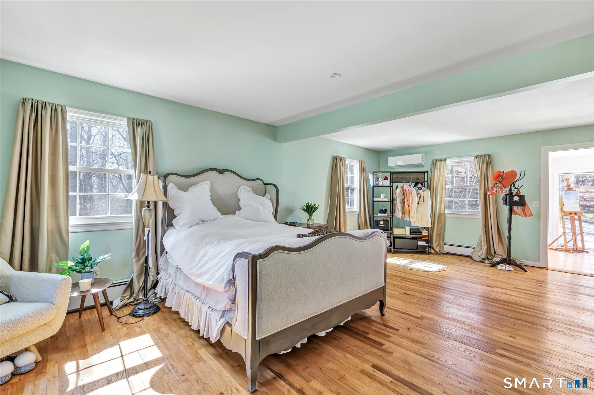 39 Marion Road Westport, CT 06880 - Photo 27 of 46 a bedroom with a bed and large windows