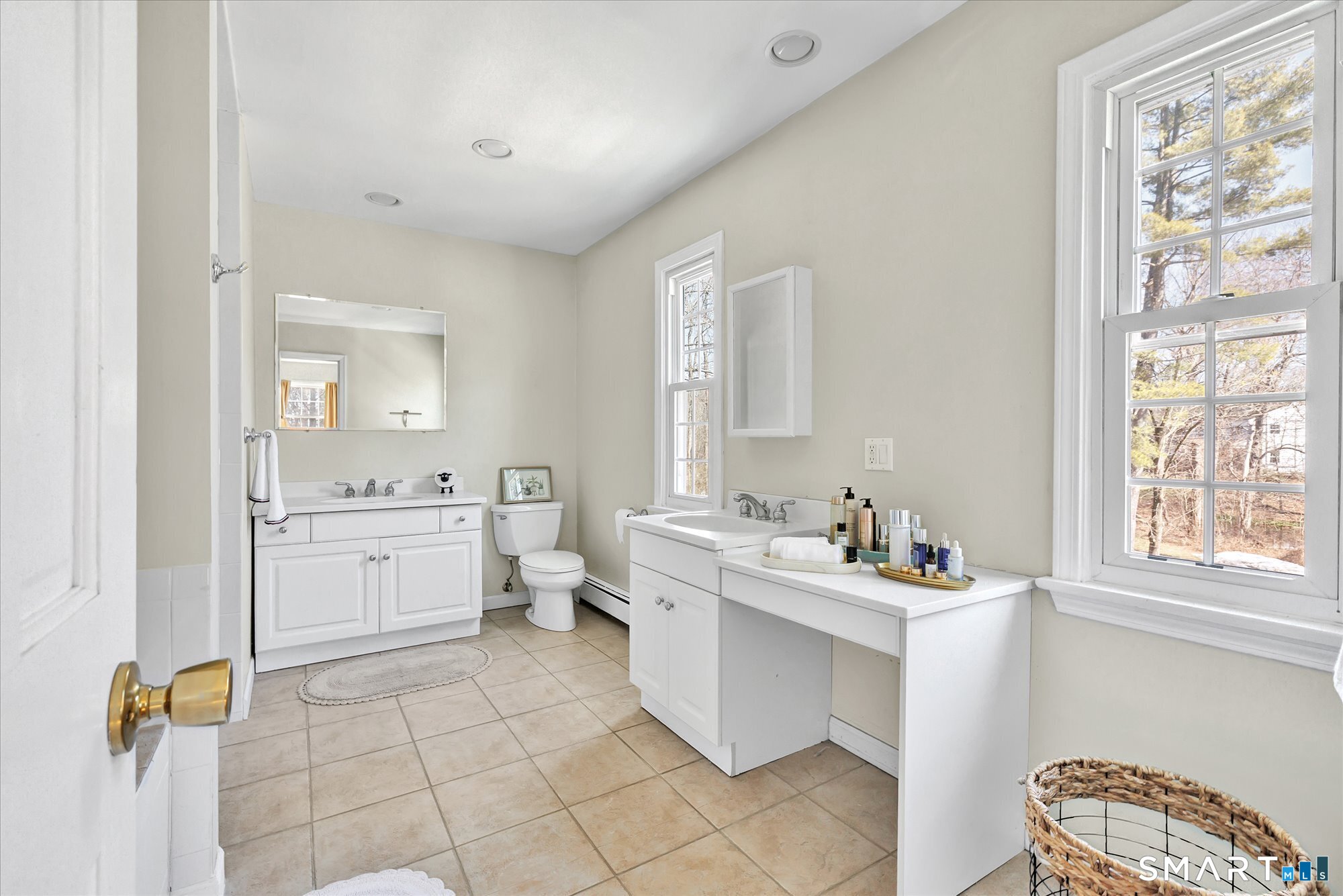 39 Marion Road Westport, CT 06880 - Photo 28 of 46 a bathroom with a sink toilet and window