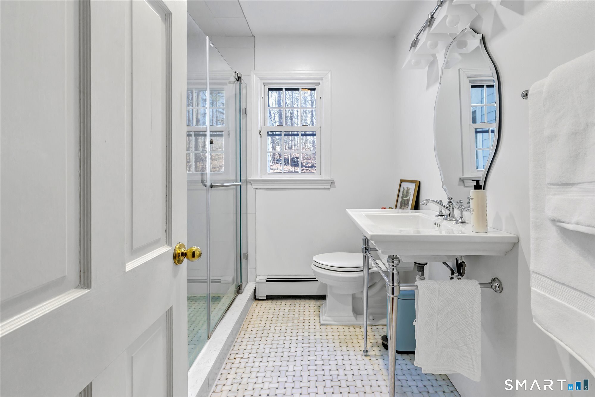 39 Marion Road Westport, CT 06880 - Photo 31 of 46 a bathroom with a sink toilet and shower