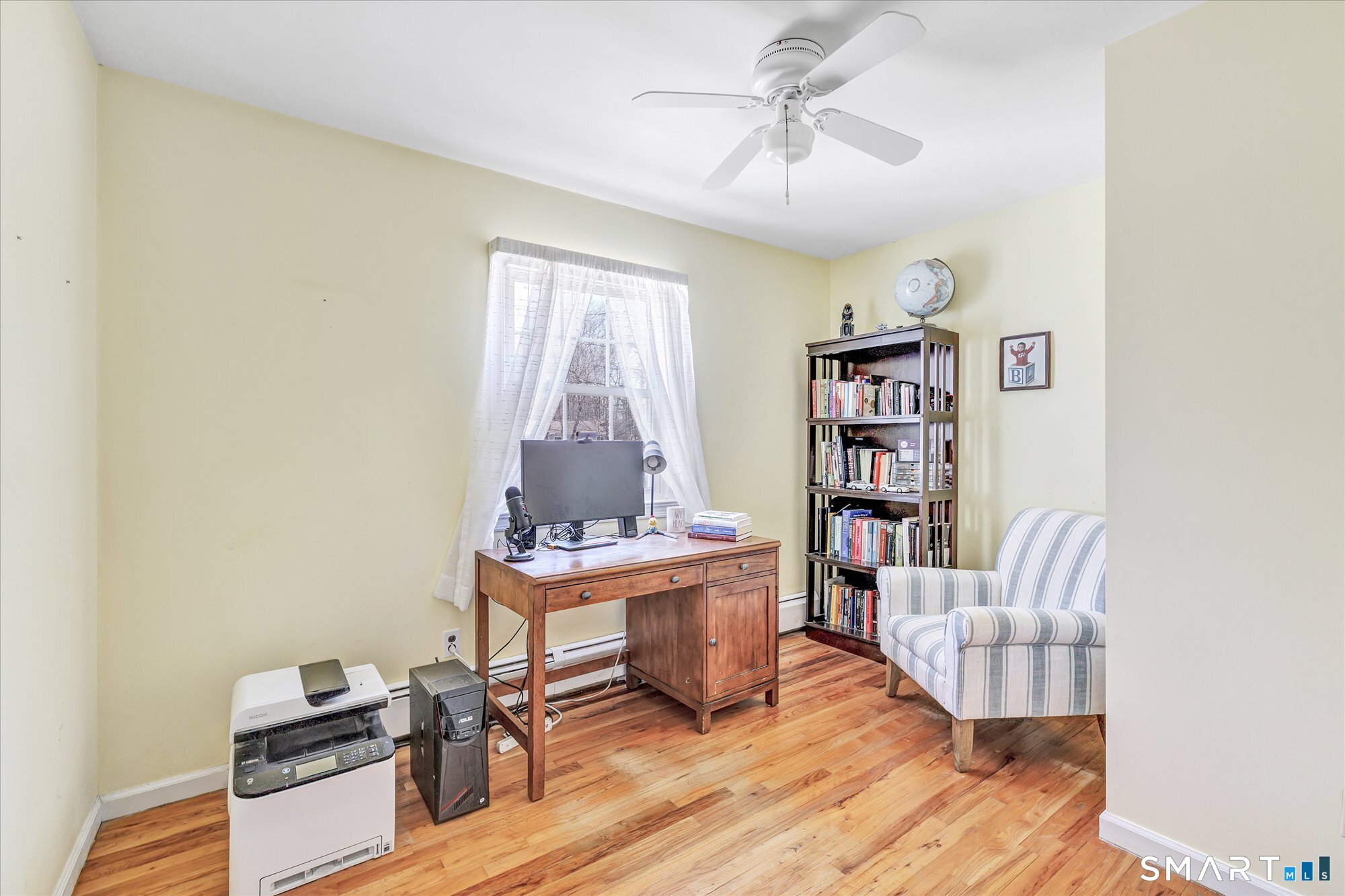 39 Marion Road Westport, CT 06880 - Photo 33 of 46 a living room with furniture and a wooden floor