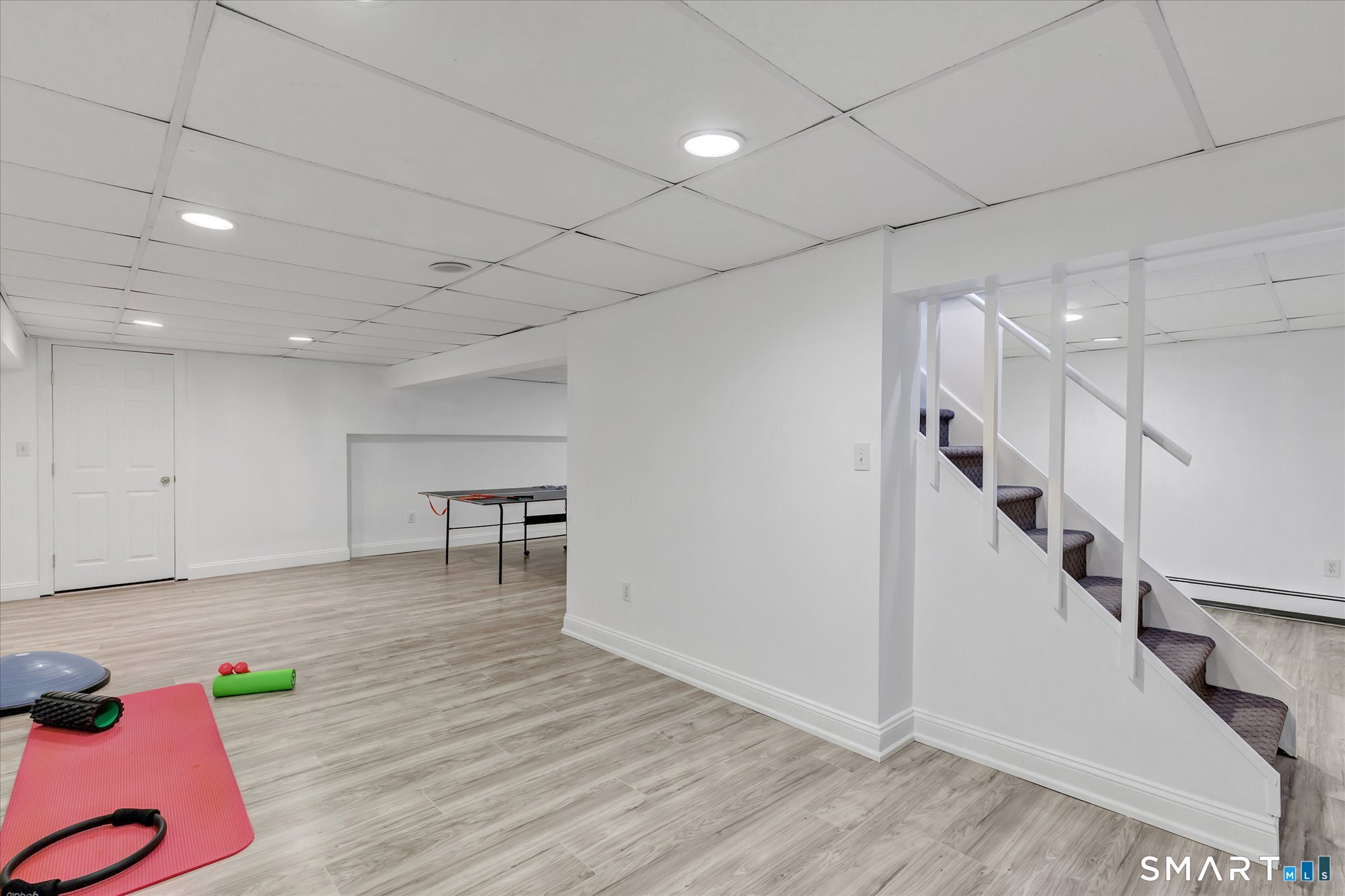 39 Marion Road Westport, CT 06880 - Photo 38 of 46 a view of livingroom with furniture and wooden floor