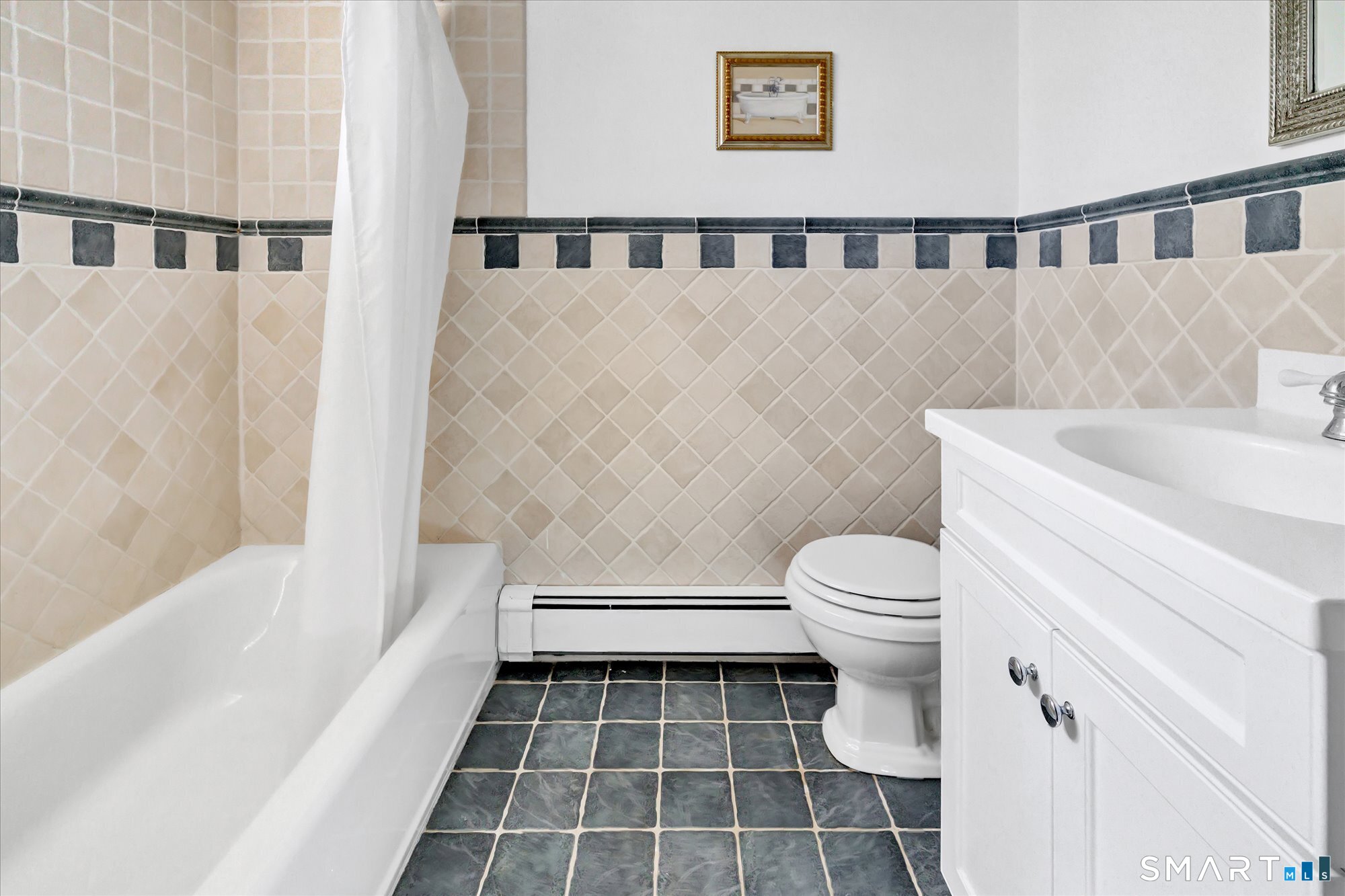 39 Marion Road Westport, CT 06880 - Photo 41 of 46 a bathroom with a toilet and a bathtub