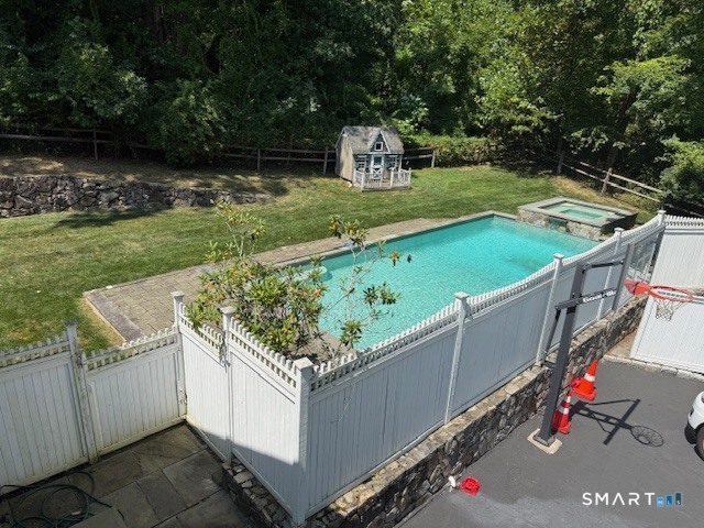 39 Marion Road Westport, CT 06880 - Photo 42 of 46 a view of a backyard with wooden fence