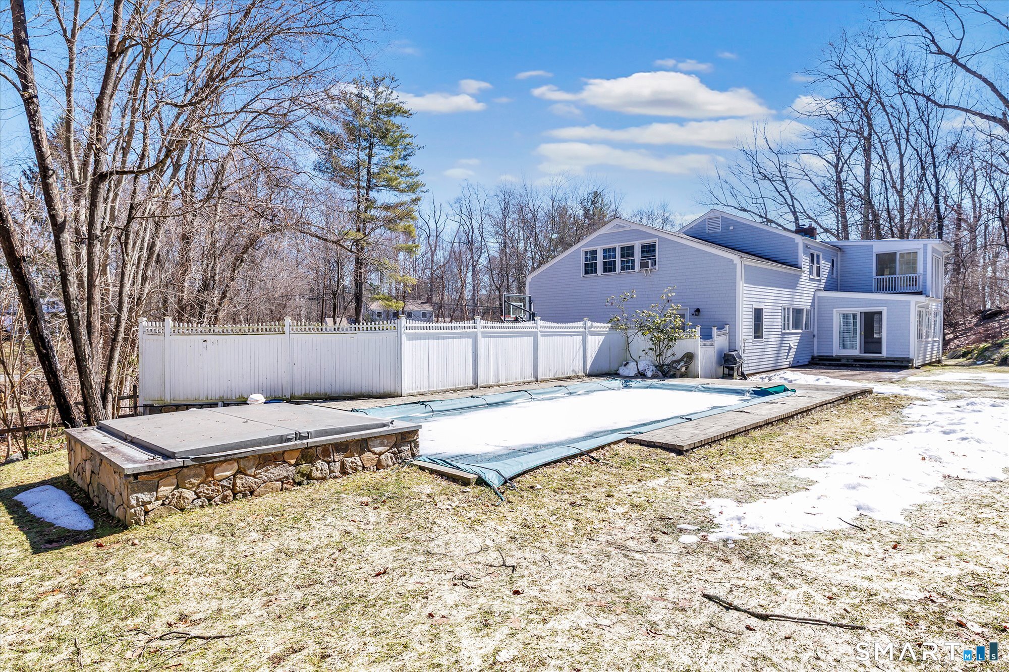 39 Marion Road Westport, CT 06880 - Photo 43 of 46 a view of a house with a snow in the middle of a yard