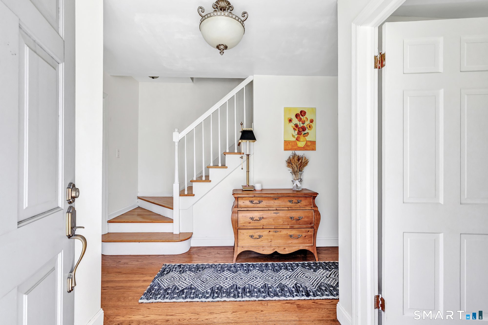 39 Marion Road Westport, CT 06880 - Photo 5 of 46 a view of entryway and hall with wooden floor