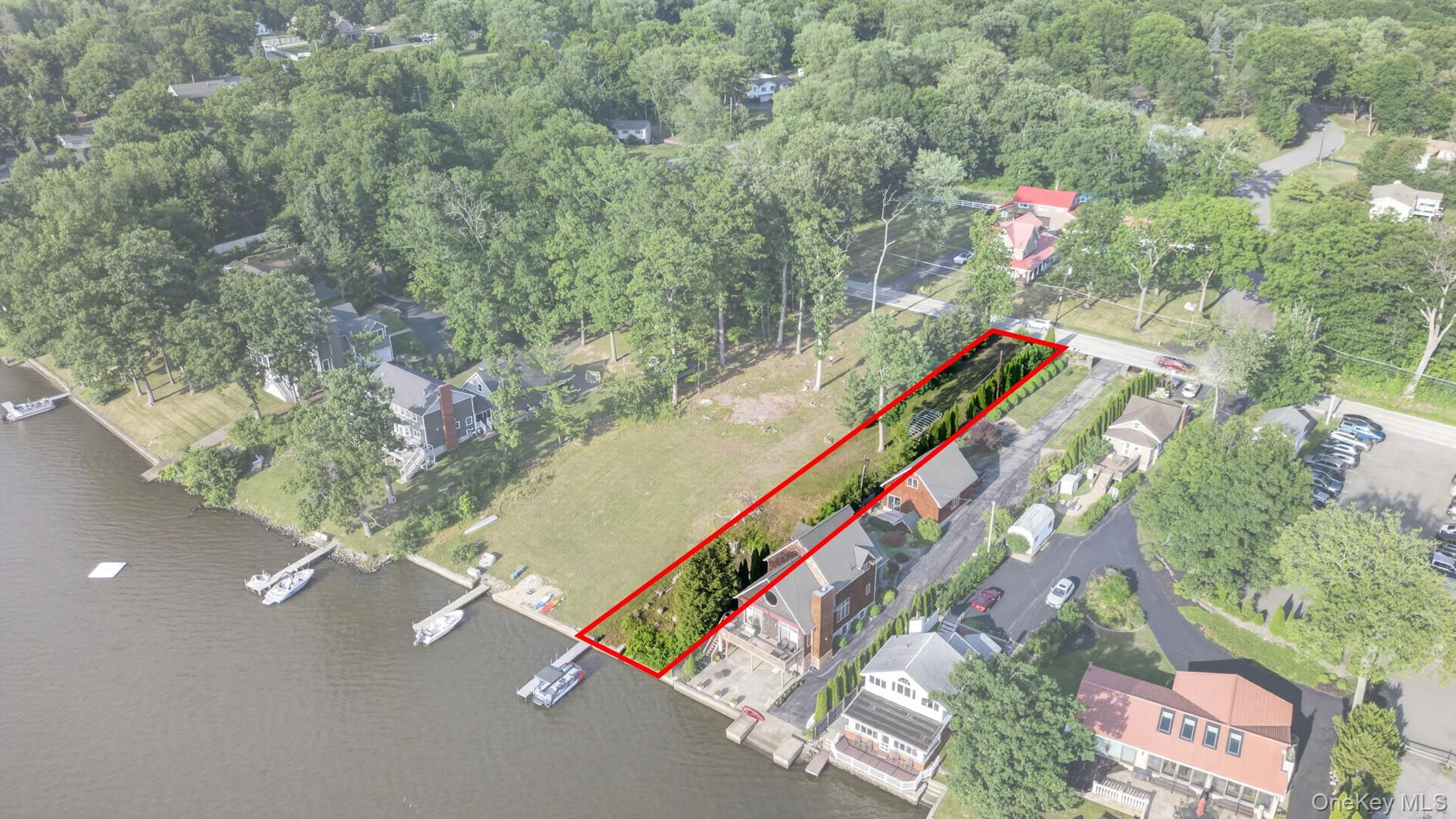 355 Lakeside Road Newburgh, NY 12550 - Photo 2 of 14 Waterfront parcel featuring a defined red boundary and mature trees