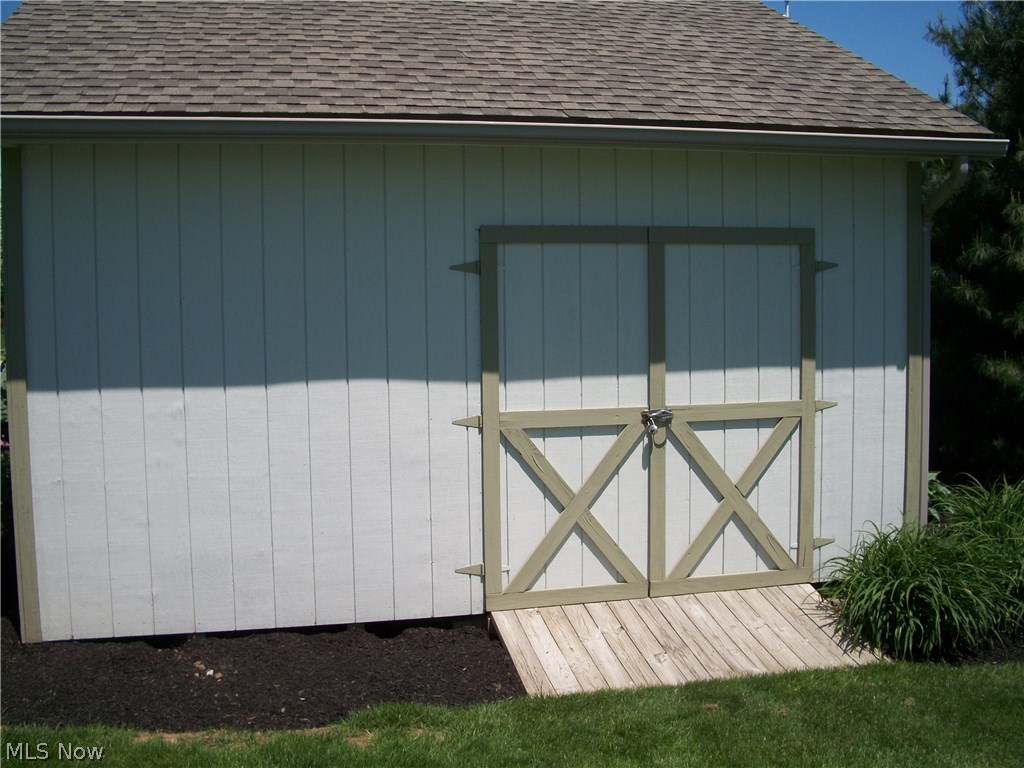8488 Massillon Road Navarre, OH 44662 - Photo 23 of 25 has double doors in the back for easy access to mower