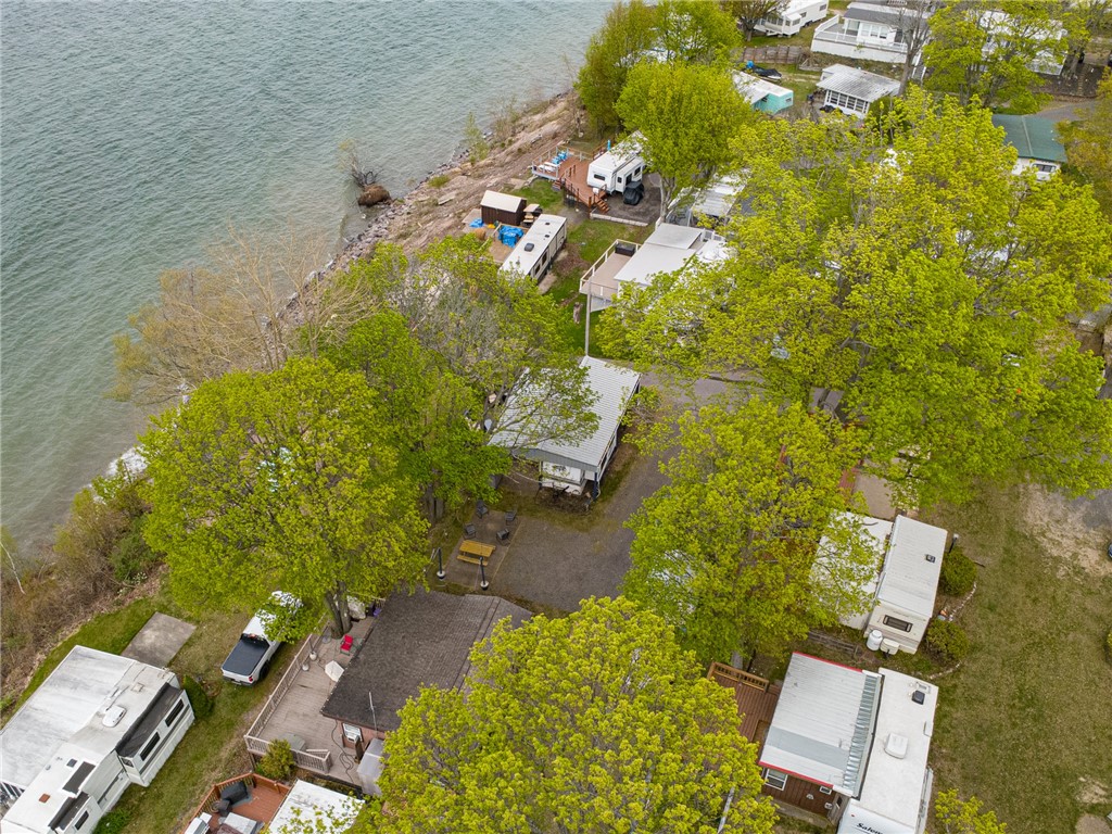7945 Lake Road, Unit 86 Sodus, NY 14555 - Photo 22 of 22 Check out all the parking room! No hill here!