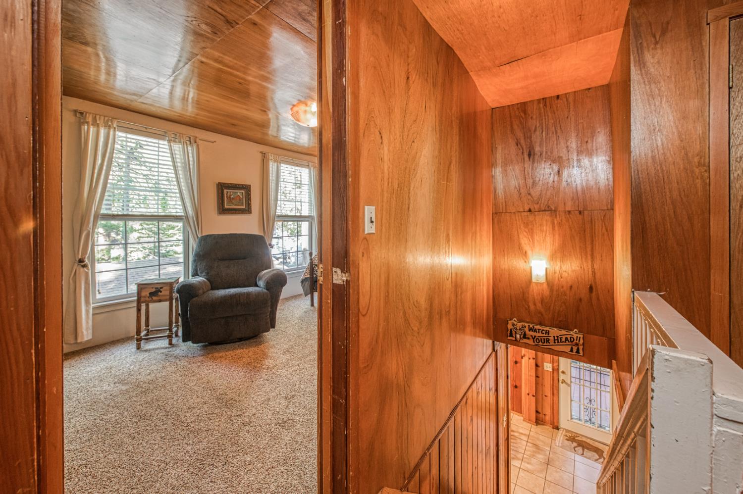 42088 North Elderberry Road Shaver Lake, CA 93664 - Photo 20 of 49 a living room with furniture and a window