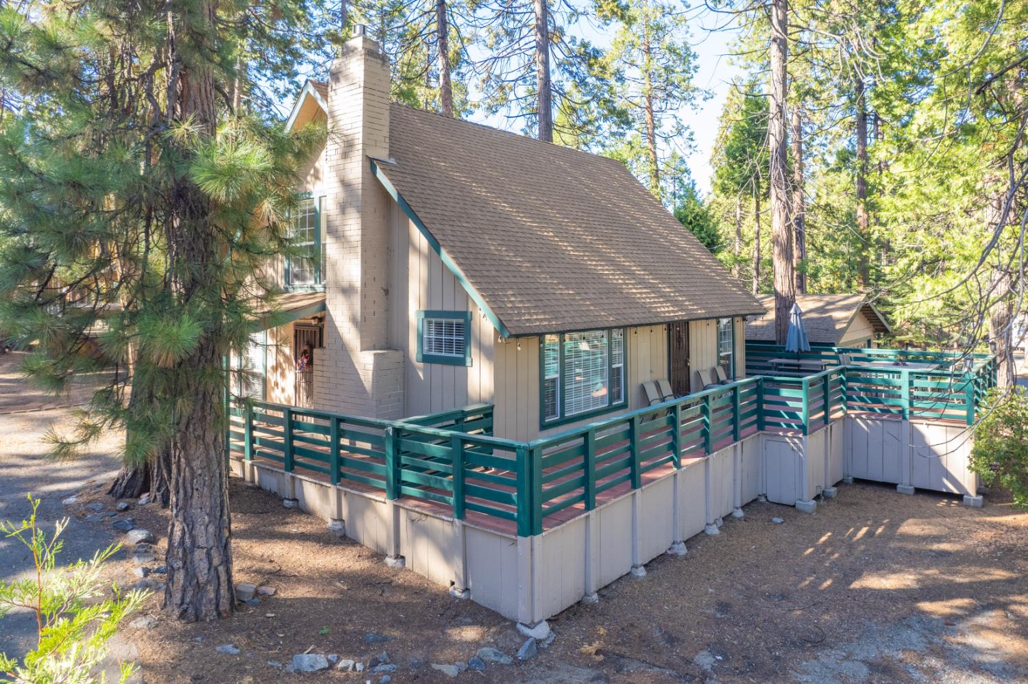 42088 North Elderberry Road Shaver Lake, CA 93664 - Photo 3 of 49 a view of a house with a yard