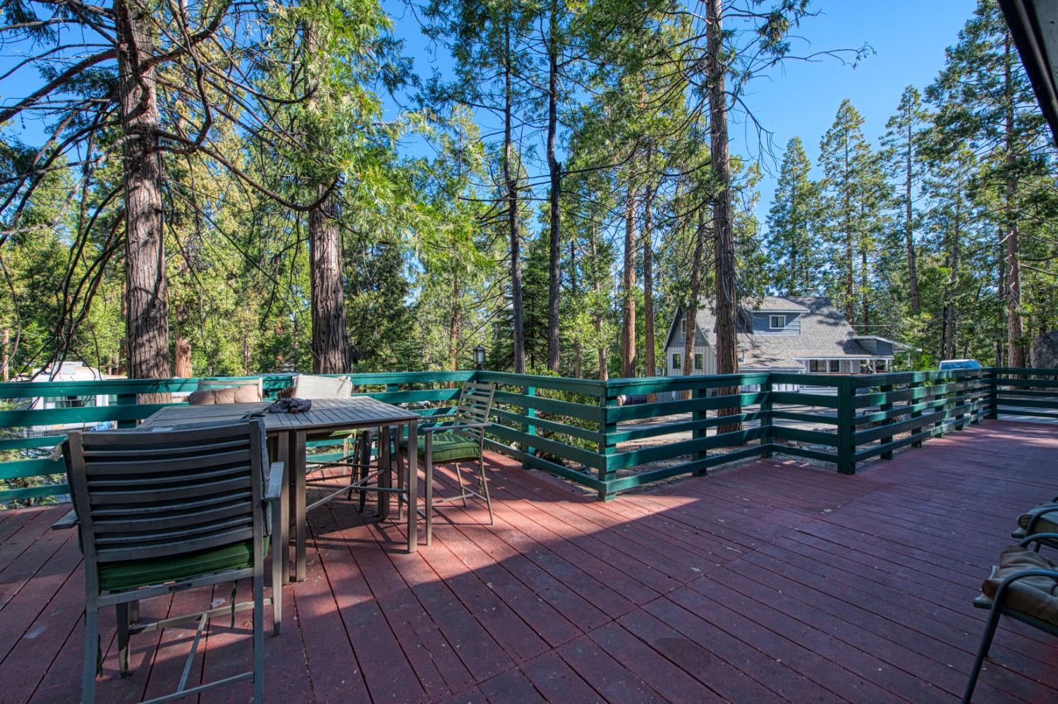 42088 North Elderberry Road Shaver Lake, CA 93664 - Photo 34 of 49 a view of a bench in a patio