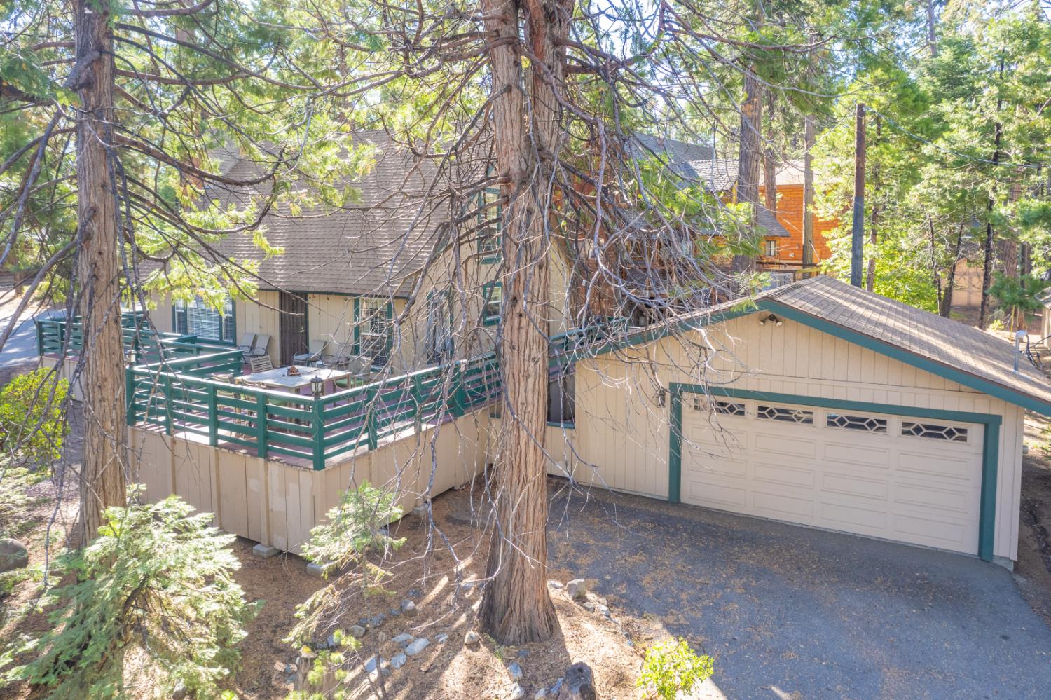 42088 North Elderberry Road Shaver Lake, CA 93664 - Photo 4 of 49 a view of a house with a yard