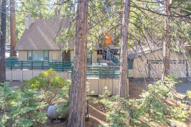 a backyard of a house with lots of green space