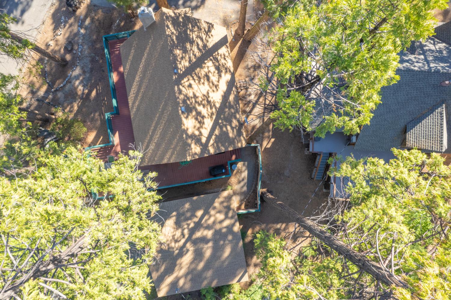 42088 North Elderberry Road Shaver Lake, CA 93664 - Photo 45 of 49 a view of a house with a yard
