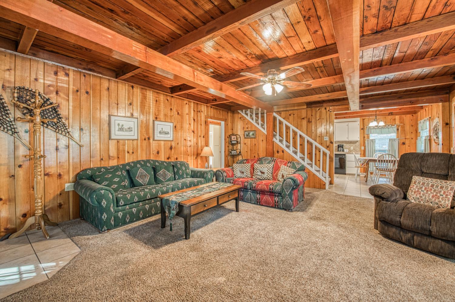 42088 North Elderberry Road Shaver Lake, CA 93664 - Photo 6 of 49 a living room with furniture and a couch