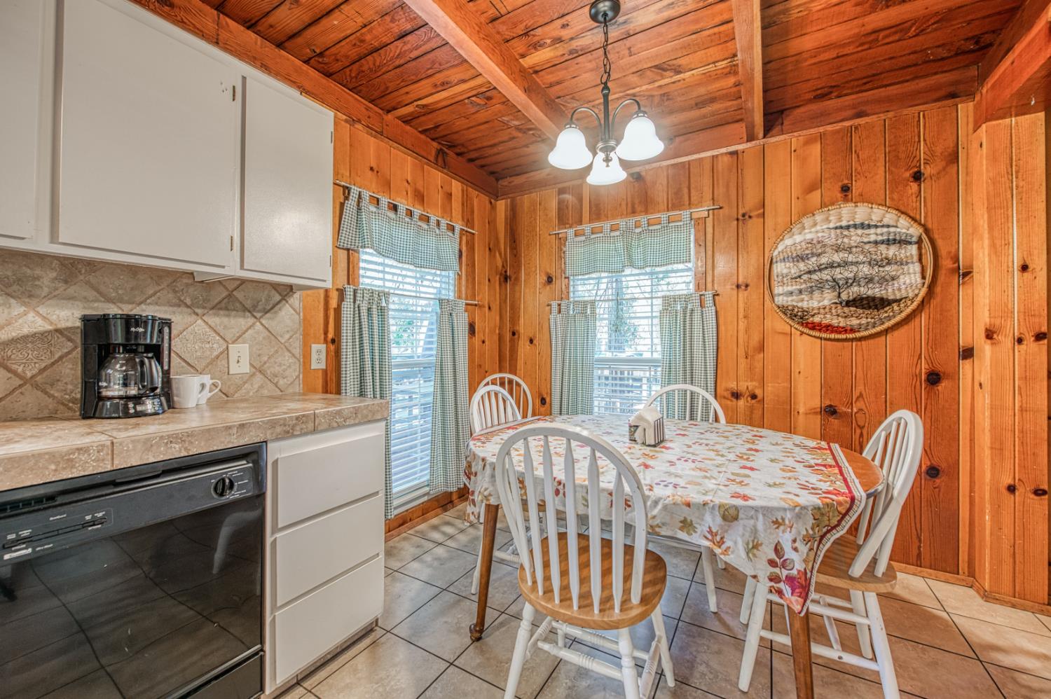 42088 North Elderberry Road Shaver Lake, CA 93664 - Photo 10 of 49 a dining room with furniture and window