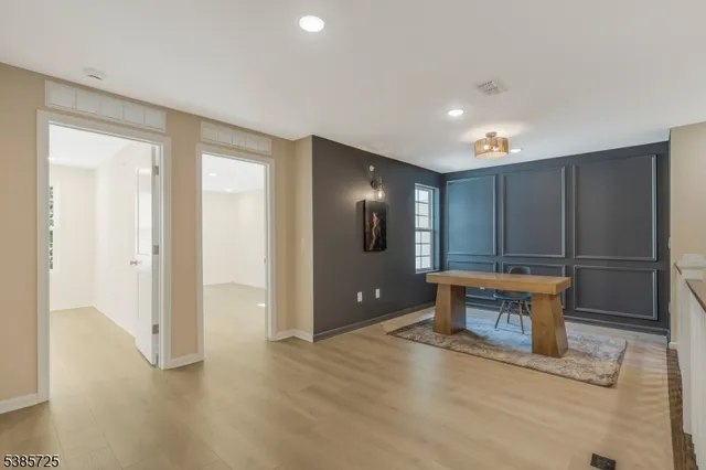 a view of a hallway with entryway