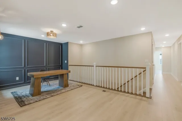 a view of a hallway with entryway
