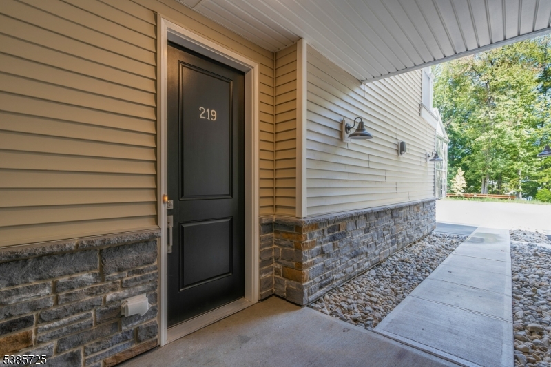 219 Myrtle Road Warren, NJ 07059 - Photo 2 of 33 a front view of a house with a garage