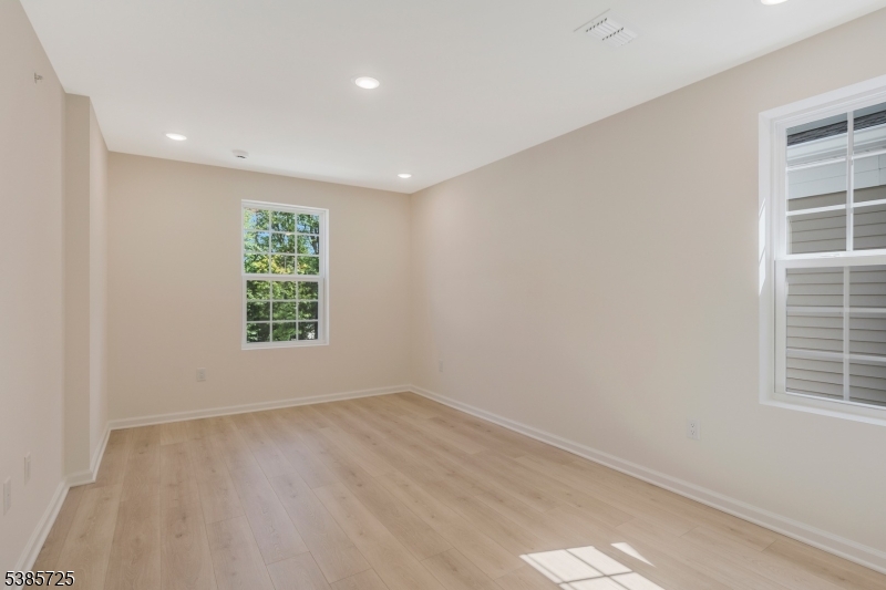 219 Myrtle Road Warren, NJ 07059 - Photo 24 of 33 an empty room with windows