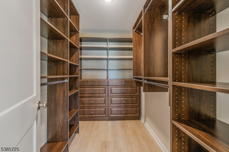 219 Myrtle Road Warren, NJ 07059 - Photo 30 of 33 a view of walk in closet with empty racks