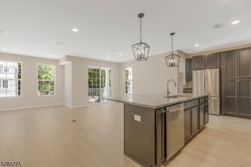 219 Myrtle Road Warren, NJ 07059 - Photo 4 of 33 a kitchen with stainless steel appliances granite countertop a stove and a sink