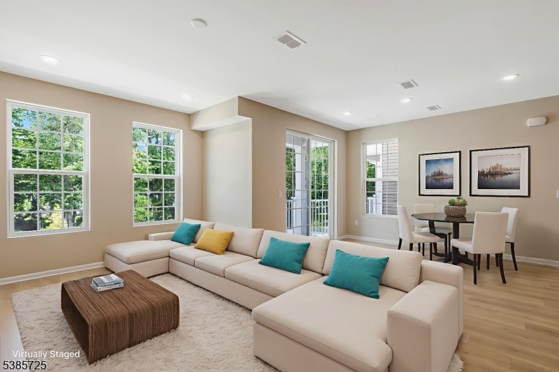 219 Myrtle Road Warren, NJ 07059 - Photo 8 of 33 a living room with furniture and a large window