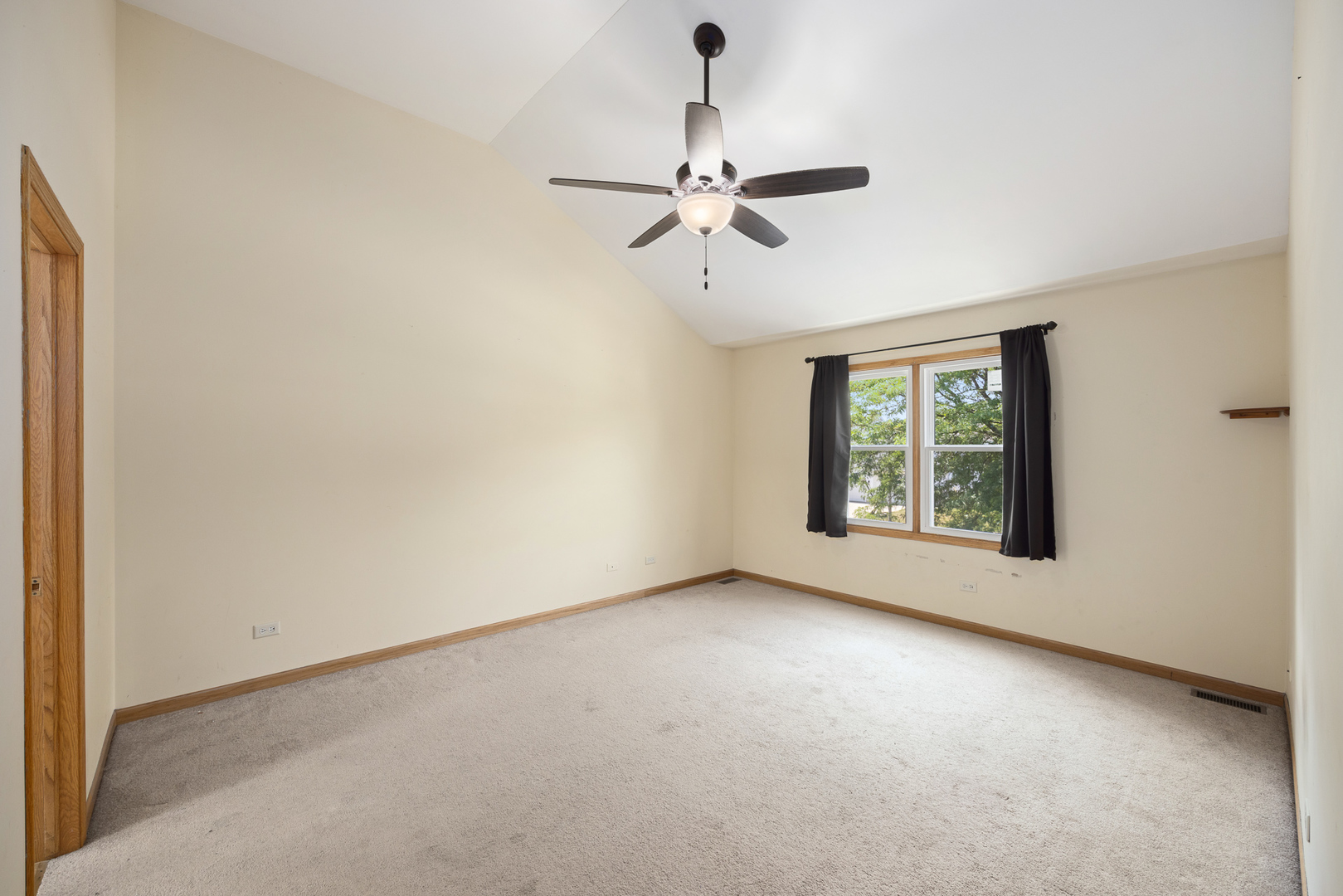 24859 Vermette Road Plainfield, IL 60585 - Photo 23 of 39 an empty room with windows and fan