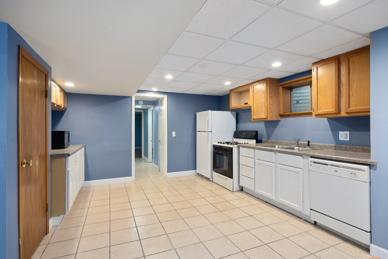 24859 Vermette Road Plainfield, IL 60585 - Photo 26 of 39 a kitchen with granite countertop a sink cabinets stainless steel appliances and a window