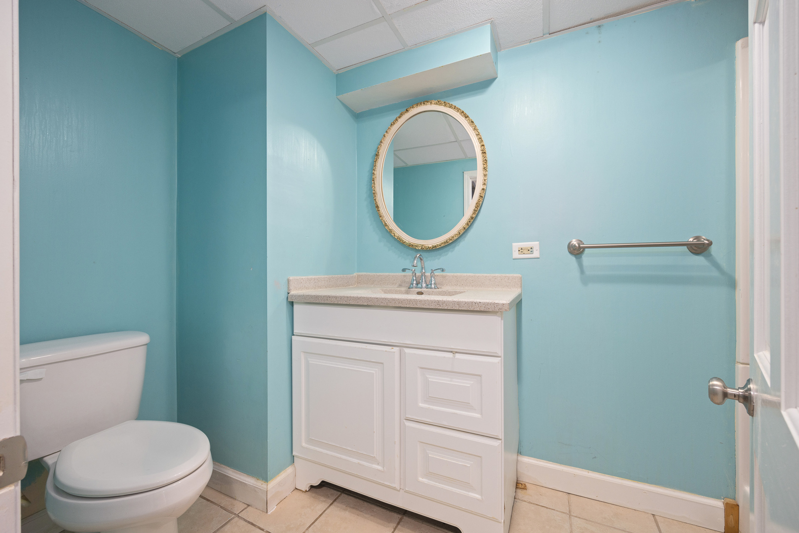 24859 Vermette Road Plainfield, IL 60585 - Photo 28 of 39 a bathroom with a toilet a sink and a mirror