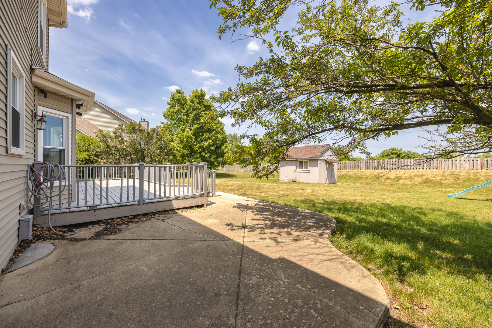 24859 Vermette Road Plainfield, IL 60585 - Photo 31 of 39 a view of a yard with wooden fence