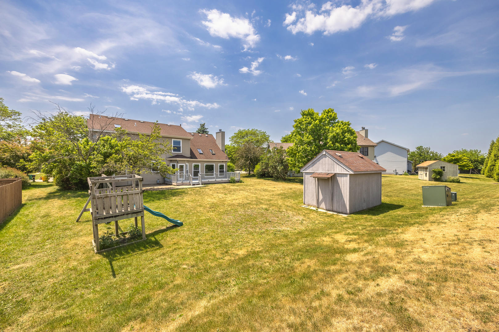 24859 Vermette Road Plainfield, IL 60585 - Photo 35 of 39 a swimming pool with an outdoor seating and a lots of palm trees