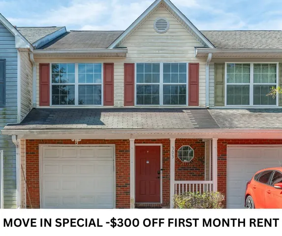 a open kitchen with a sink and a large window